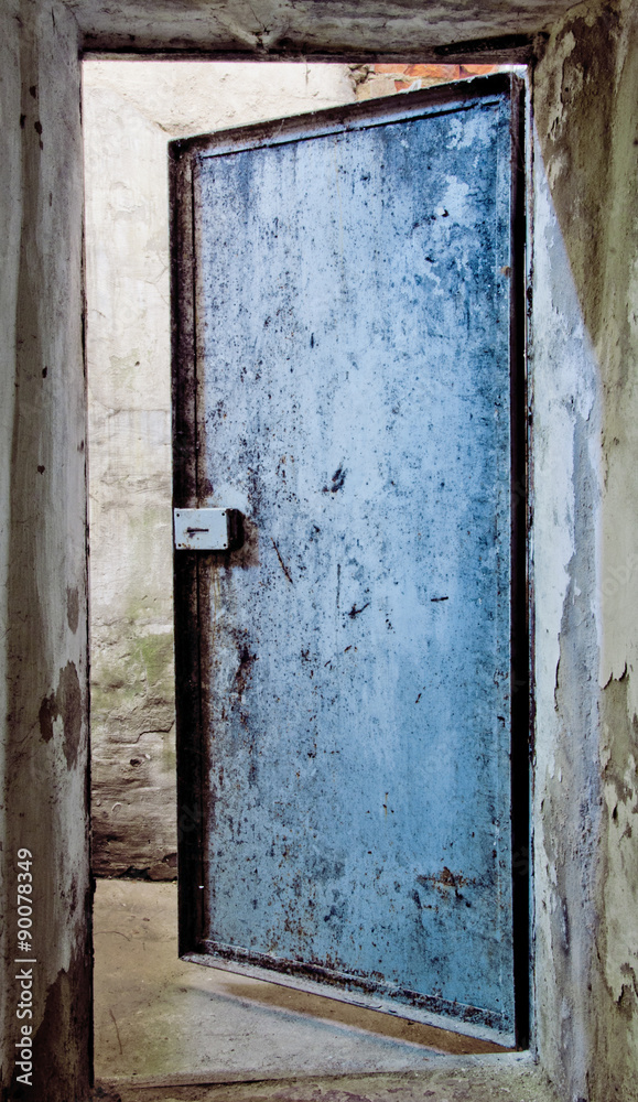 door to an abandoned warehouse