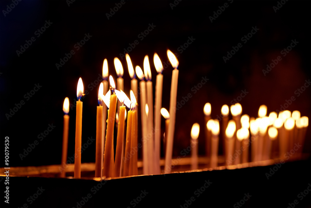 Candles in the Holy Sepulchre Church in Jerusalem Candles in the Holy Sepulchre Church in Jerusalem