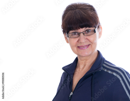 Pension age good looking woman in sport outfit against of white background