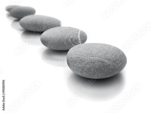 line of stones isolated on white background