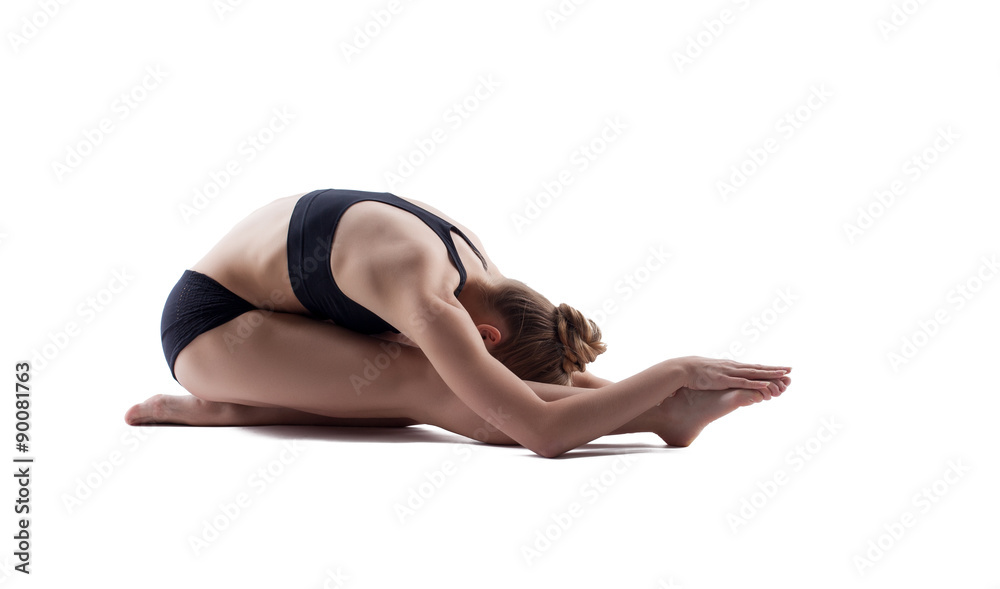 Flexible woman posing in studio, isolated on white Flexible woman posing in studio, isolated on white