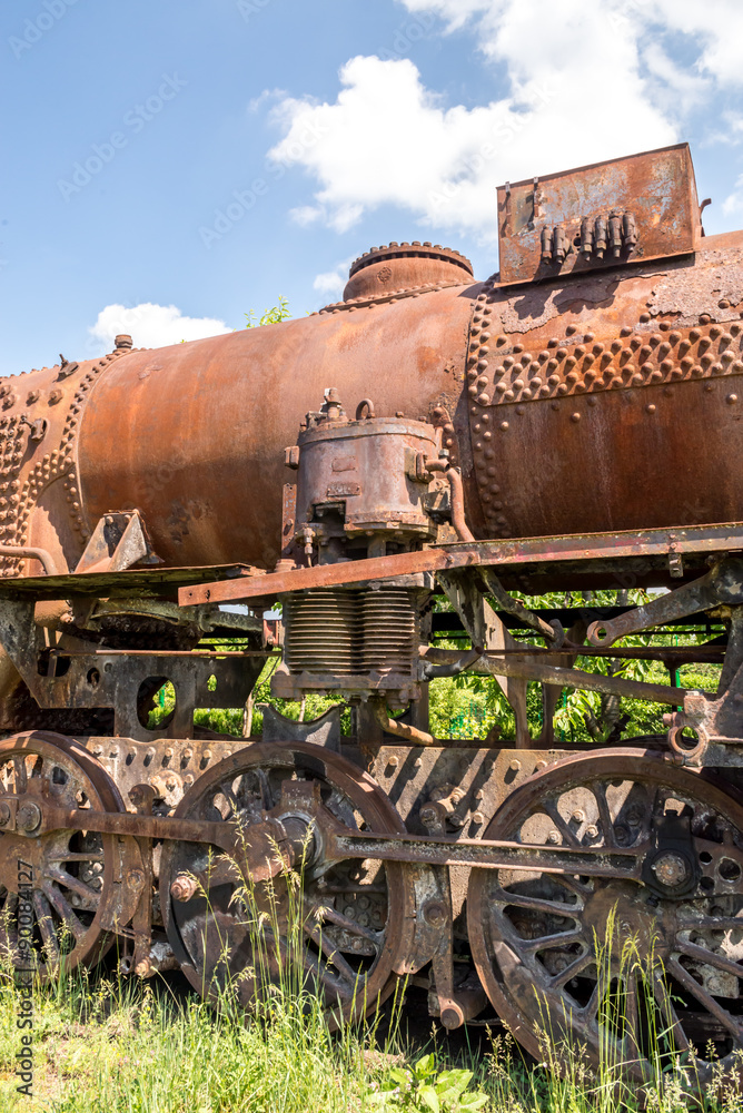 Naklejka premium Old Czechoslovakian CSD steam engine on graveyard, rusty, boiler detail