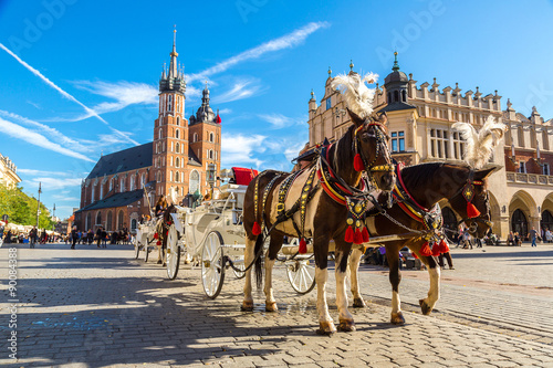 Stampa su Tela Horse carriages at main square in Krakow