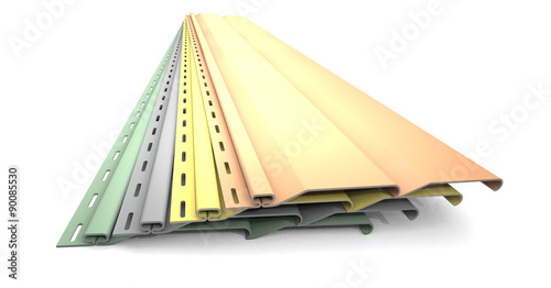 Plastic siding panels of different colors.
