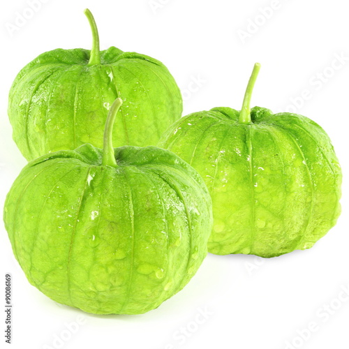 tomatillo or mexican green tomato fruit or vegetable in white background photo