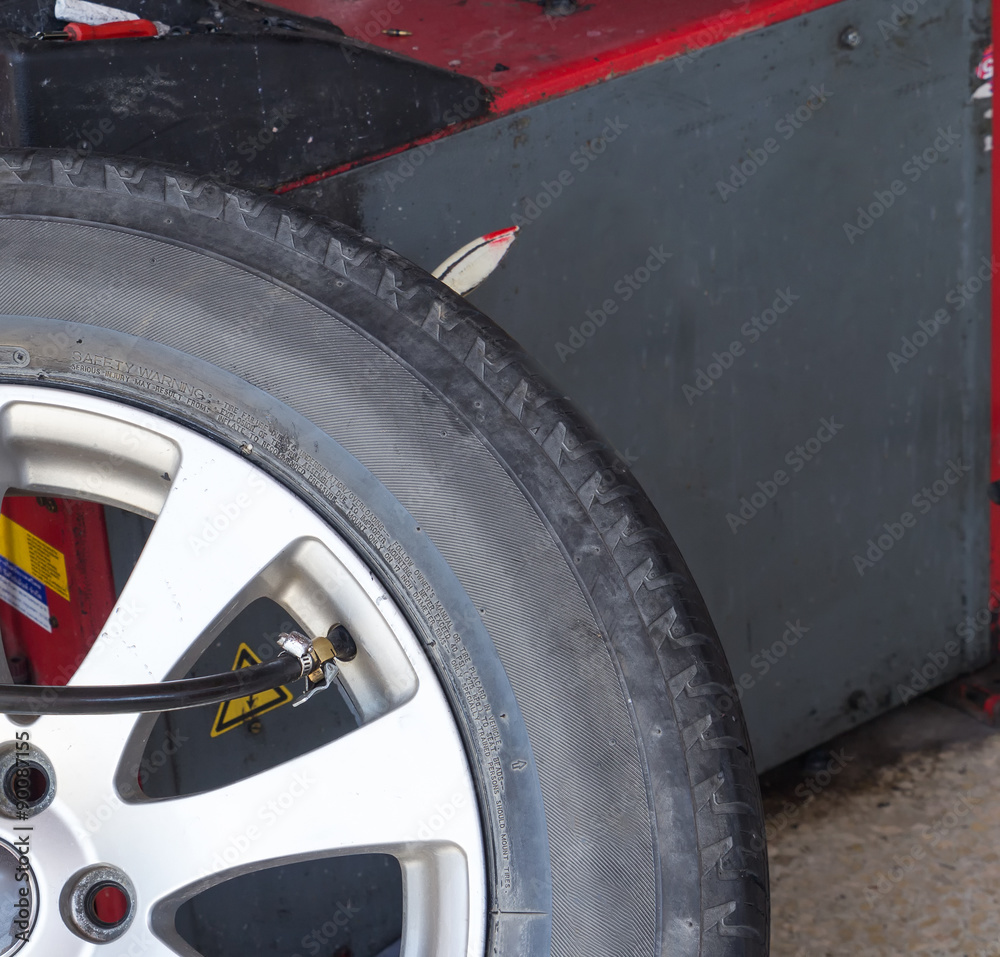 Pressure check and inflating car tire Pressure check and inflating car tire