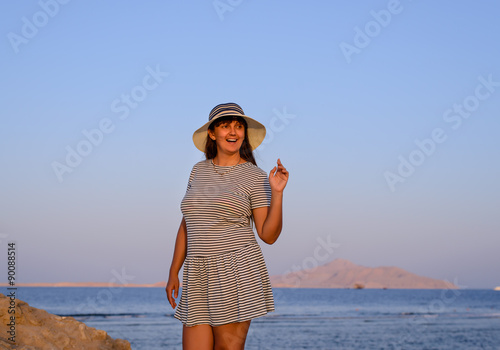 Trendy woman posing in evening light