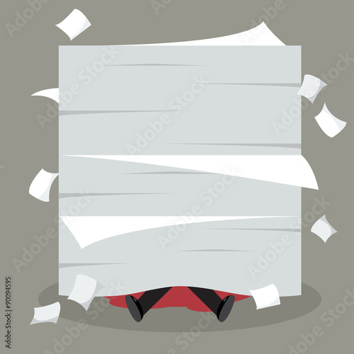 Businessman under a lot of documents