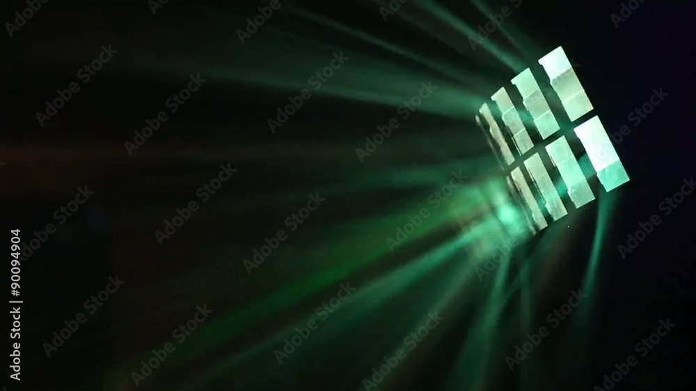Lumiere at the disco, rays penetrate through the smoke
