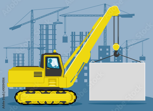 A crane lifts the load.