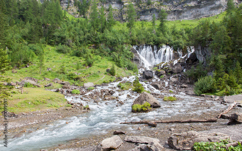 Waterfall in the forest photo