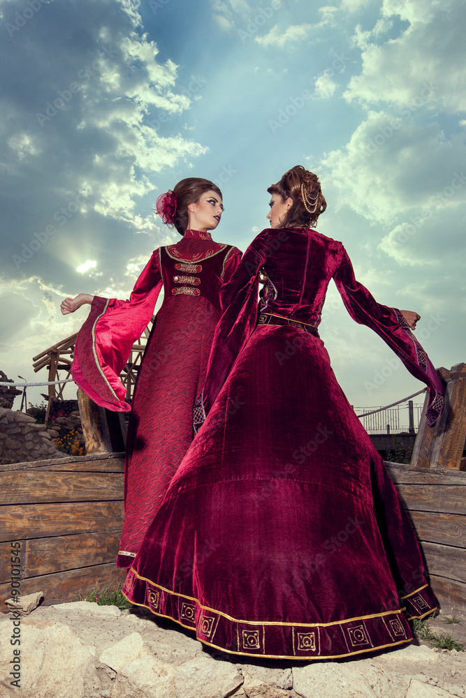 Two woman in aristocratic vintage outfit on boat