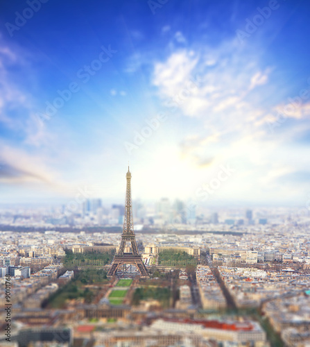 Aerial View of Paris skyline and Eiffel tower with sunrise on a background, France. Business, Love and travel concept © sergeialyoshin