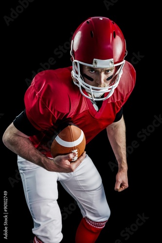 Portrait of focused american football player 