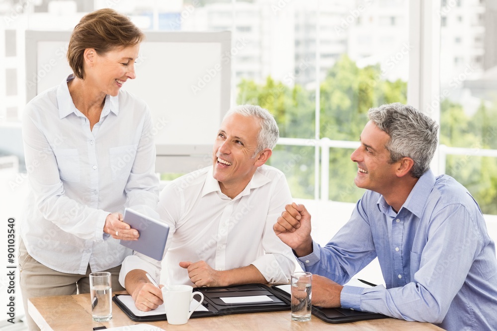 Smiling business people making an arrangement Smiling business people making an arrangement