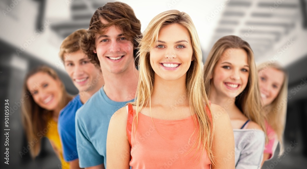 Composite image of group standing behind one another Composite image of group standing behind one another