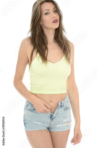 Sexy Young Woman In A Vest Top and Denim Jeans
