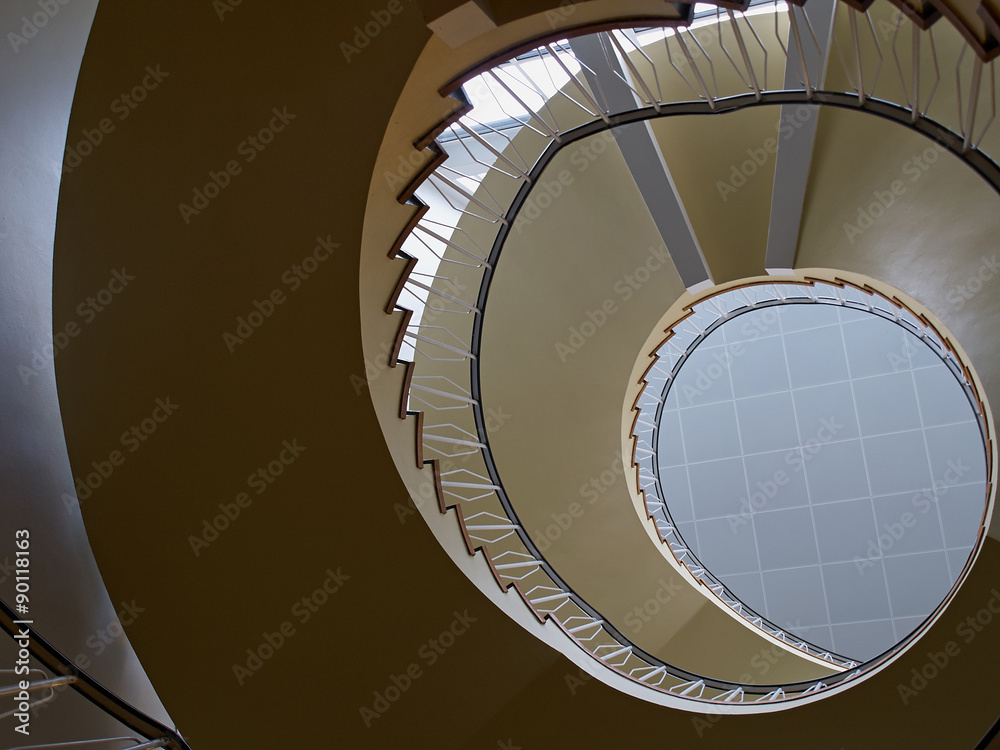 Obraz premium Upside view of a spiral staircase