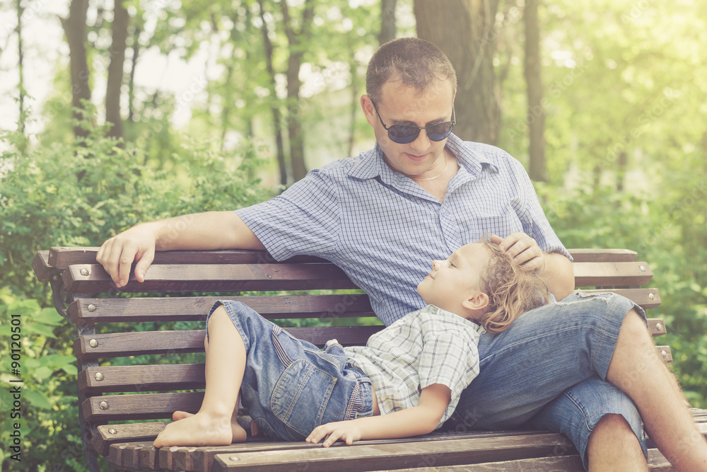 Fototapeta premium Father and son playing at the park at the day time.