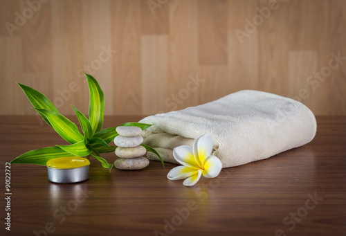 Spa still life with aromatic candles,flower and towel