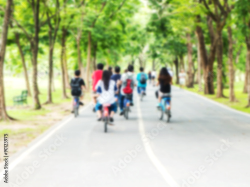 Blur background of people cycling