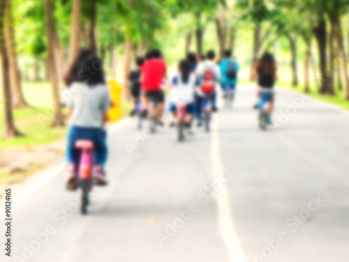 Blur background of people cycling