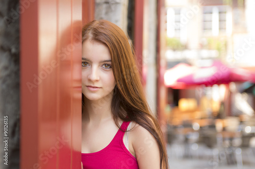 Young happy teenage girl in urban place Free Download Young happy teenage girl in urban place - GFXLoad