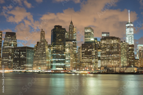 Skyscrapers in Manhattan at night, New York City. View from Brooklyn heights.