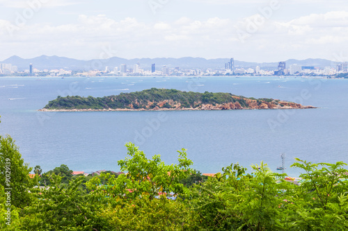 A view of small island, Pattaya city in background
