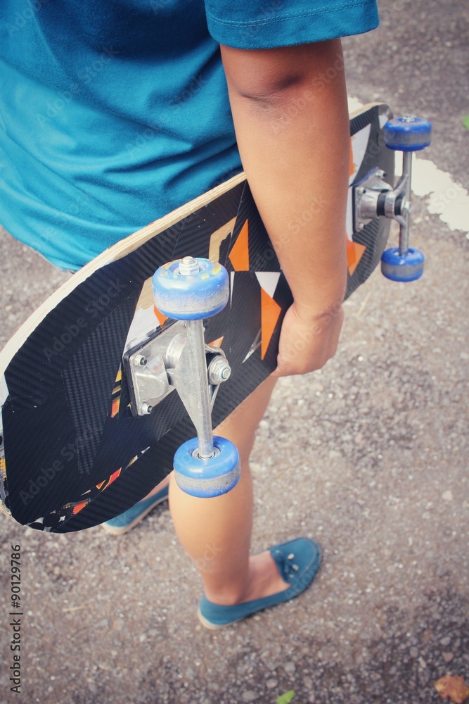 Young girl with skateboard