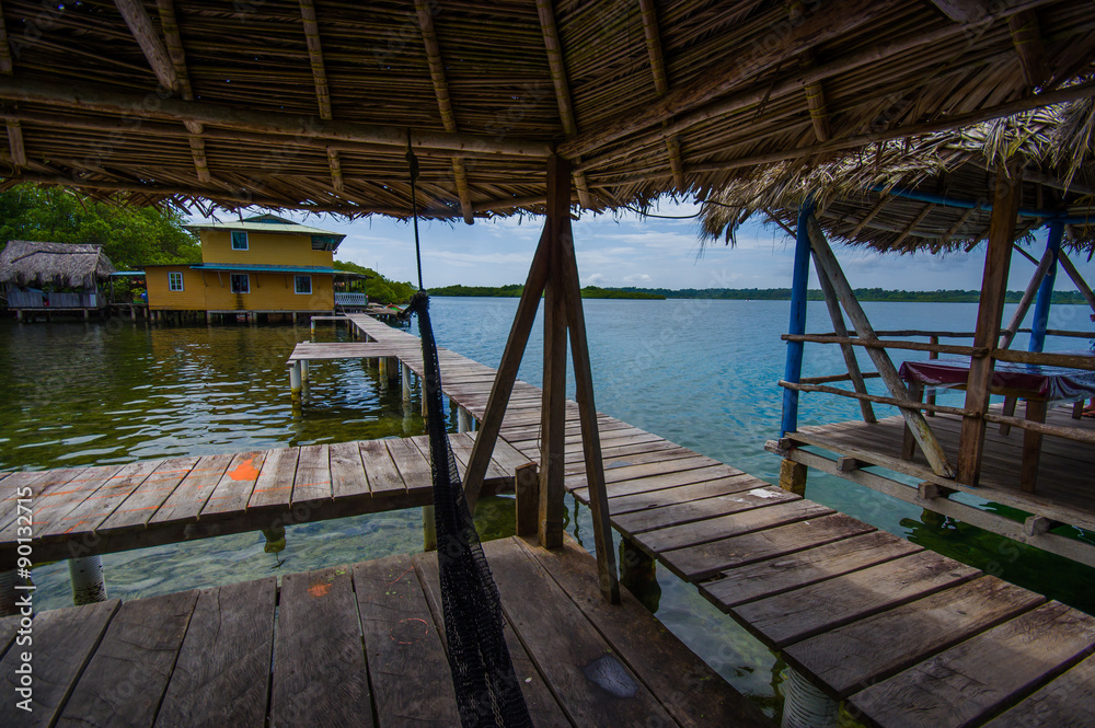 BOCAS DEL TORO, PANAMA - APRIL 23, 2015 : Wooden Pier on Bocas del Toro province of Panama comprising an archipelago off the Caribbean coast