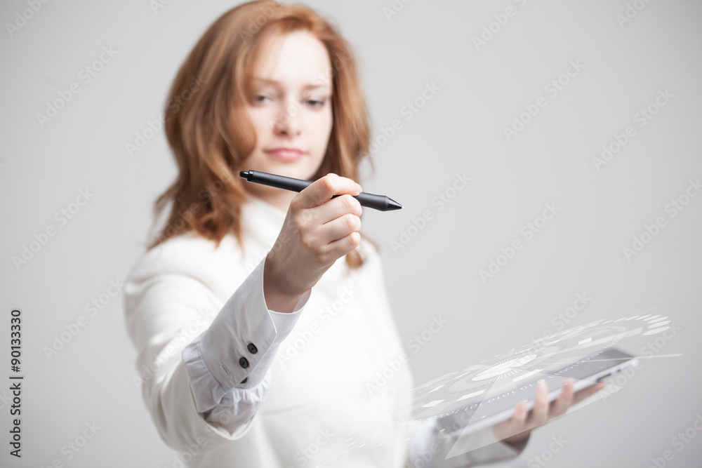 Young girl working with virtual screen Young girl working with virtual screen