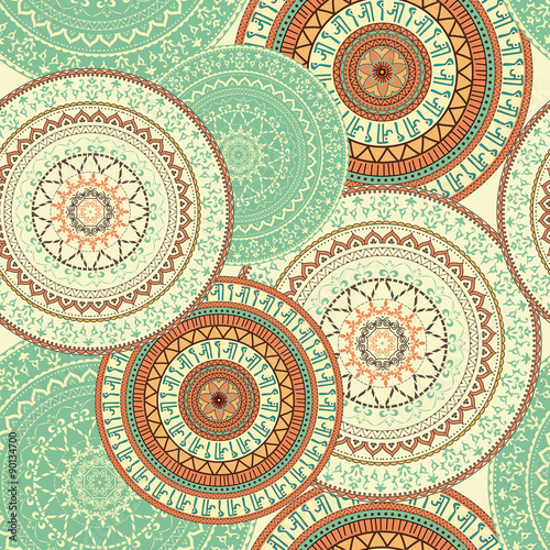 Mandala. Indian, Arabic, Persian pattern. Arabesque. Colorful seamless background with circular ornaments in ethnic style.