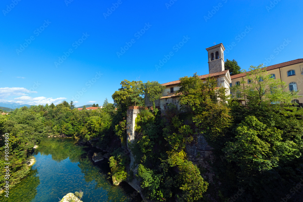 Natisone River in Cividale del Friuli - Italy / Natisone River, view of Devil's bridge in the medieval town Cividale del Friuli, Udine, Friuli Venezia Giulia, Italy