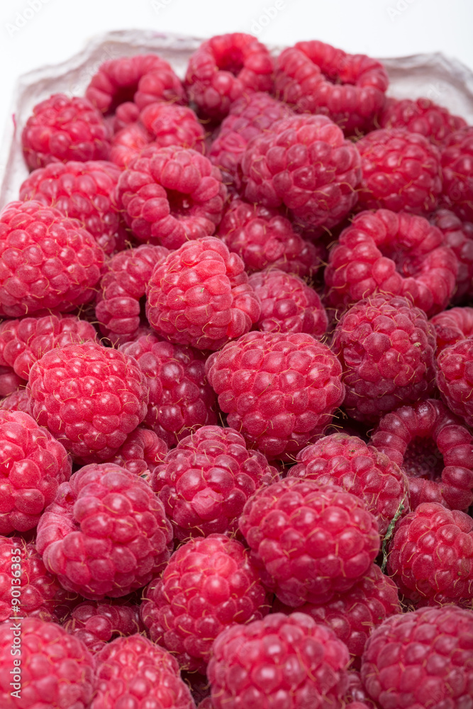 A beautiful selection of freshly picked ripe red raspberries. A beautiful selection of freshly picked ripe red raspberries.
