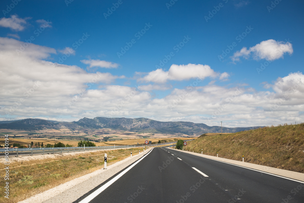 Empty open road through the mountains. Spain.