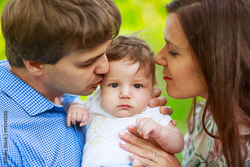 parents with baby son, close-up, summer parents with baby son, close-up, summer