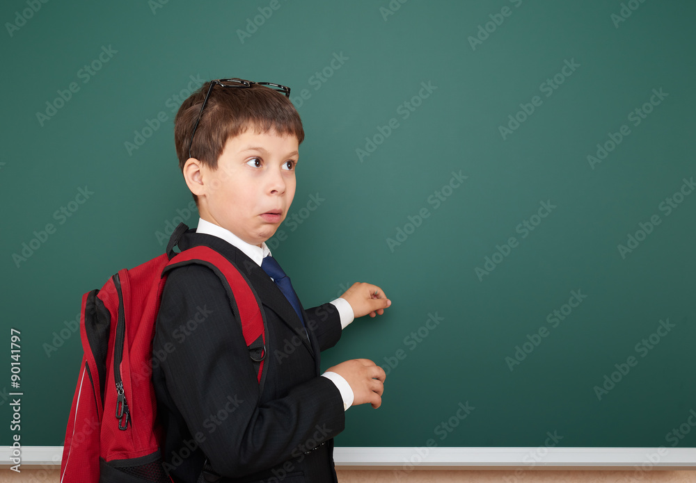 school boy portrait near board