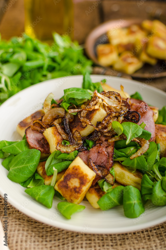 Potato gnocchi with salad and onions Potato gnocchi with salad and onions