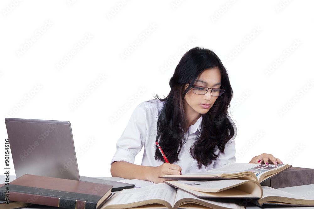 Smart learner doing school assignment Smart learner doing school assignment