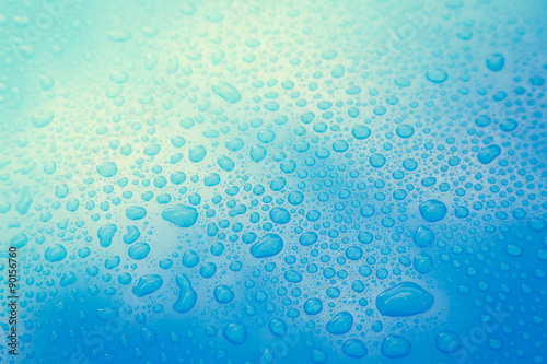Drops of water on blue floor