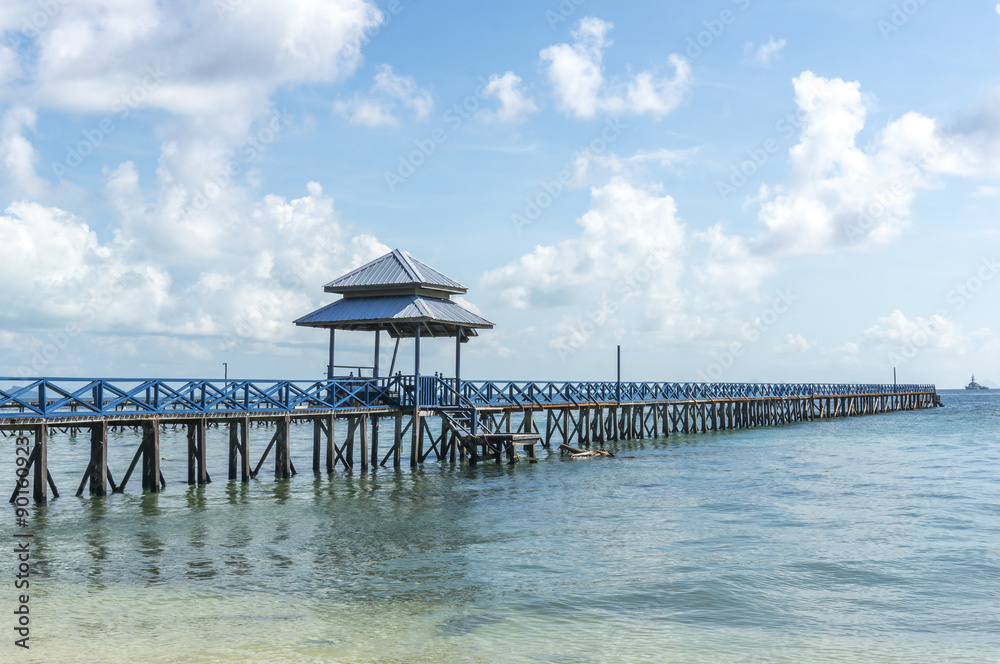 Jetty with beautiful beach and clear water