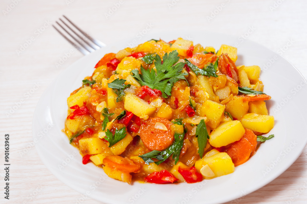 stewed vegetables. zucchini, peppers, onions, carrots, potatoes. stewed vegetables. zucchini, peppers, onions, carrots, potatoes.