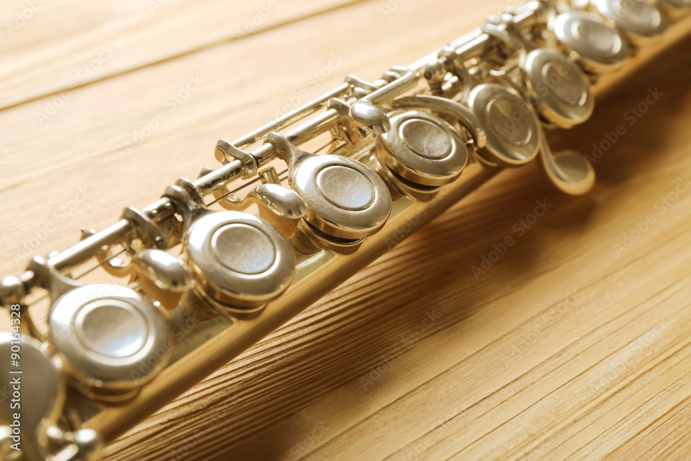 Naklejka premium Flute on wooden background