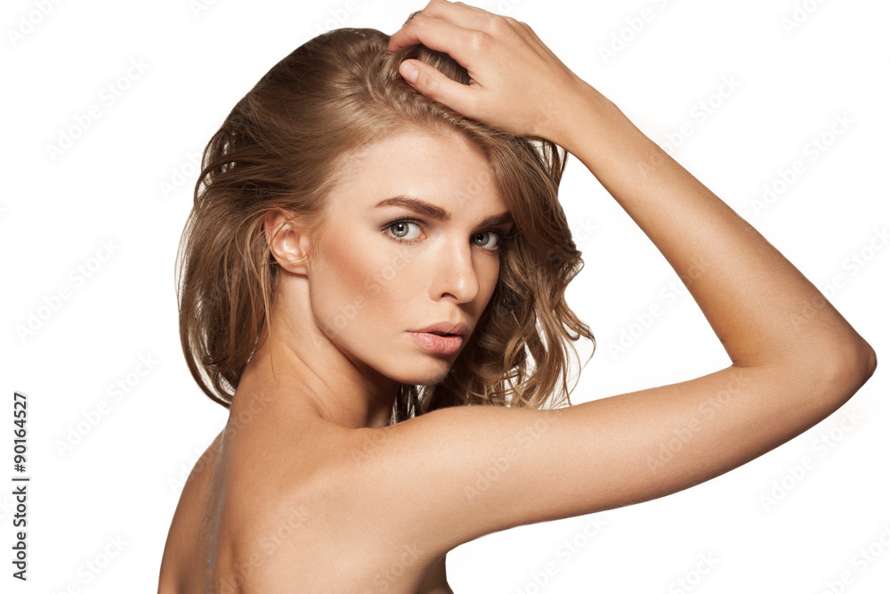 Portrait of beautiful woman looking at camera. Beauty girl. Isolated on white background Portrait of beautiful woman looking at camera. Beauty girl. Isolated on white background