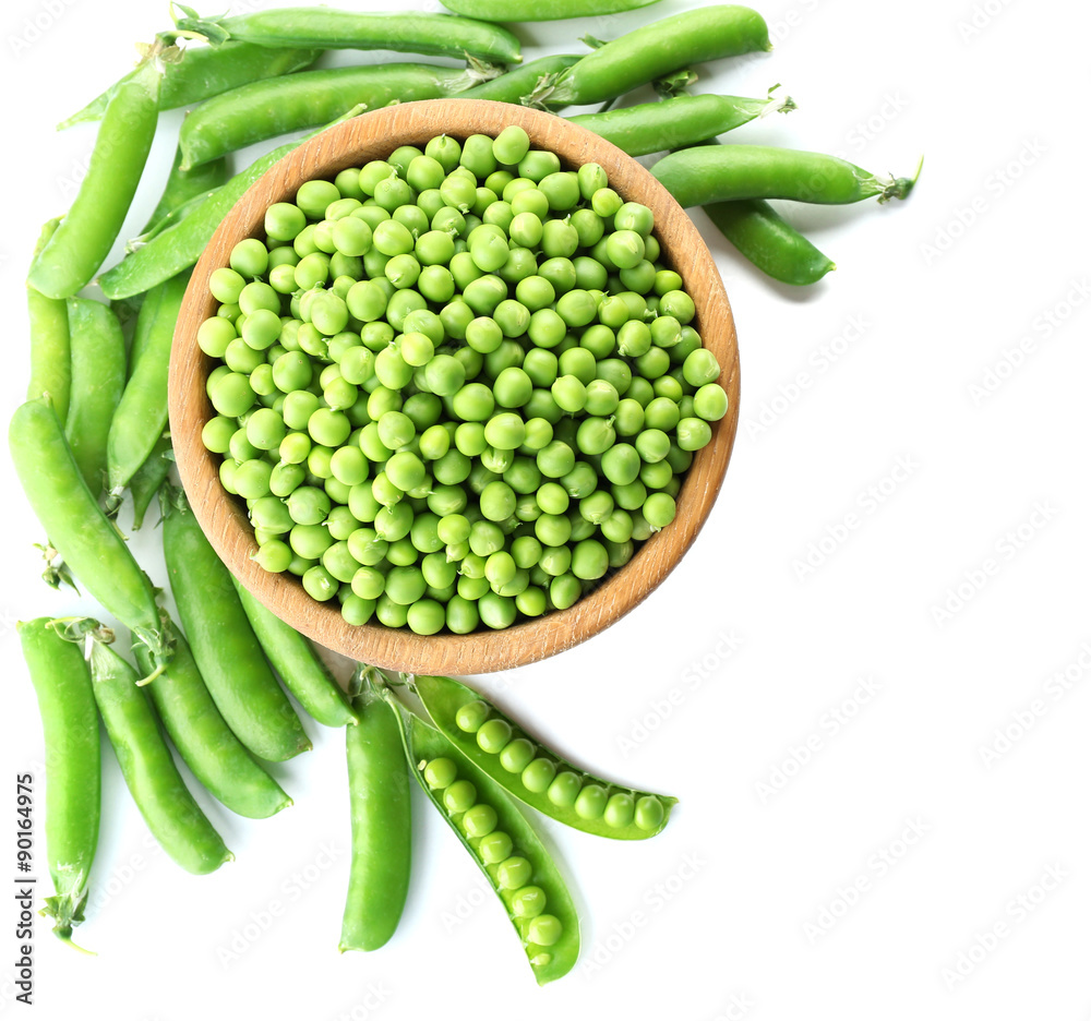 Fresh green peas in bowl isolated on white