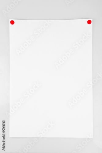 White sheet of paper attached on white background
