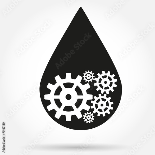 Silhouette symbol of oil industry drop with gears cogs photo