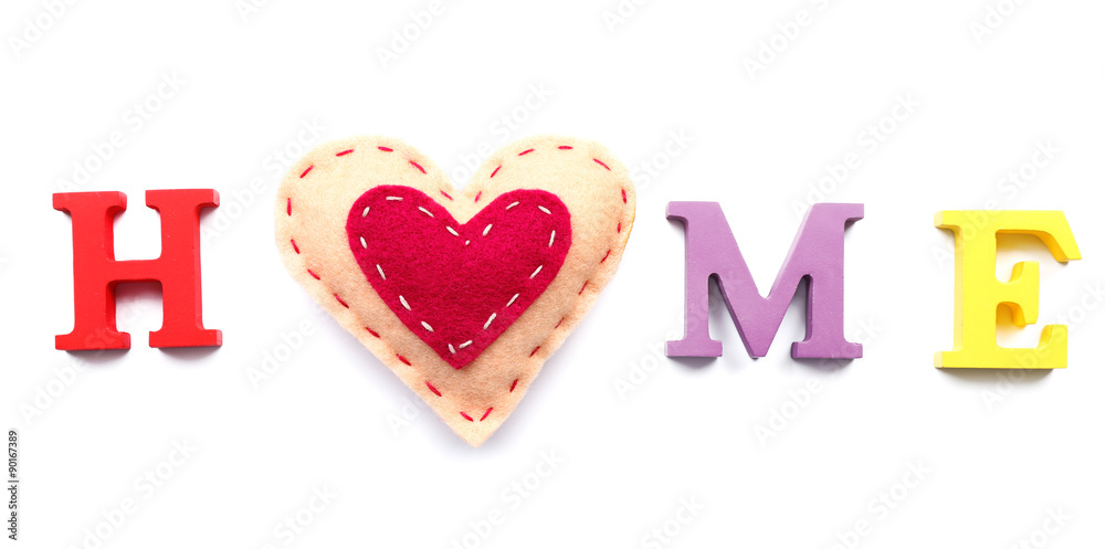Decorative letters forming word HOME with heart isolated on white Decorative letters forming word HOME with heart isolated on white