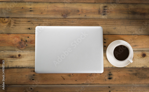 Laptop on wood table